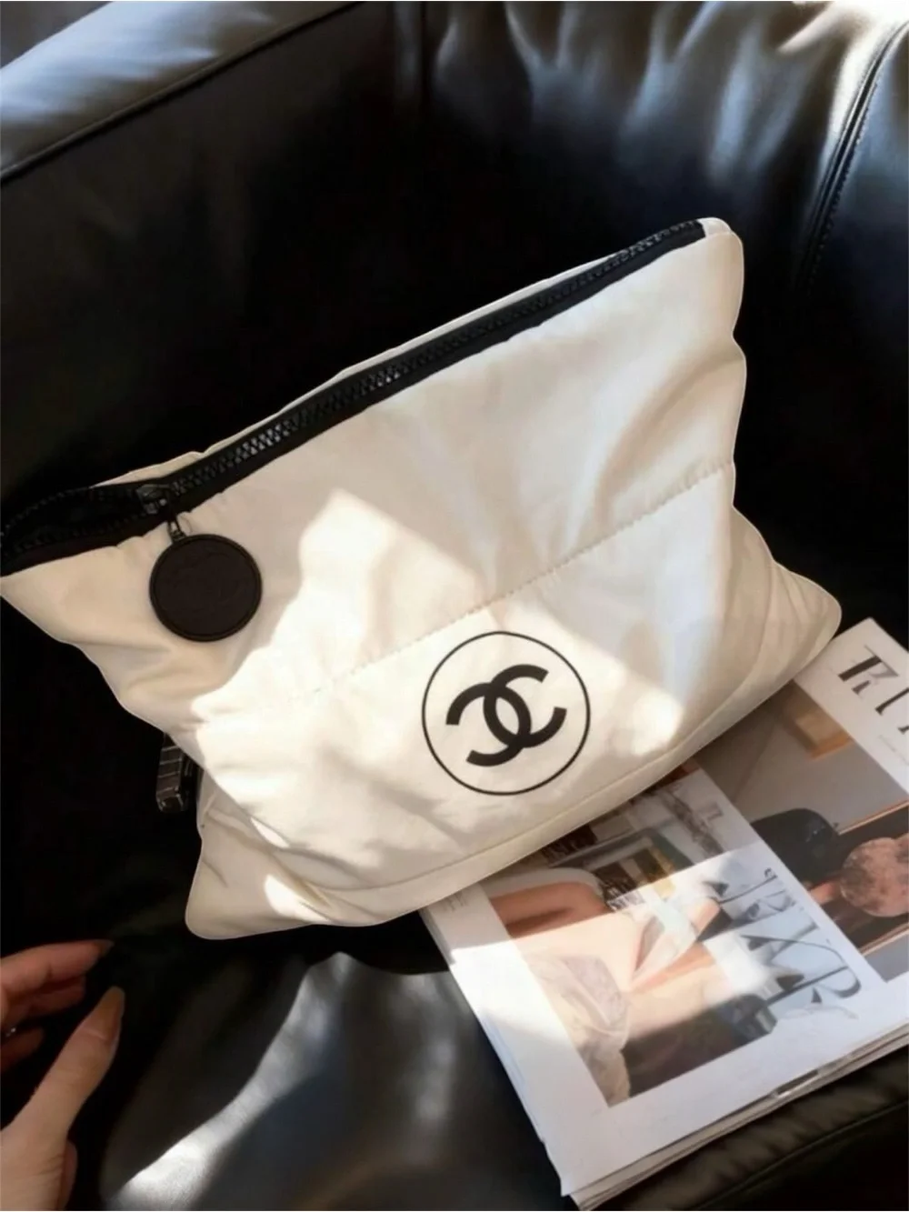 CHANEL White Quilted Cosmetic Pouch with Black Logo
